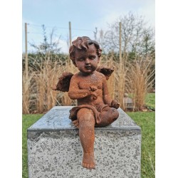 Antique garden sculpture of an Angel (boy) - Sitting model