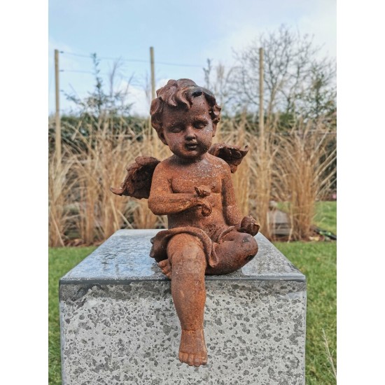 Antique garden sculpture of an Angel (boy) - Sitting model