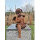 Antique garden sculpture of an Angel (boy) - Sitting model