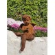 Antique garden sculpture of an Angel (boy) - Sitting model