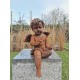Antique garden sculpture of an Angel (boy) - Sitting model
