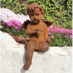 Antique garden sculpture of an Angel (boy) - Sitting model