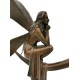 Amazing bronze sculpture of a bronze fairy sitting on the moon