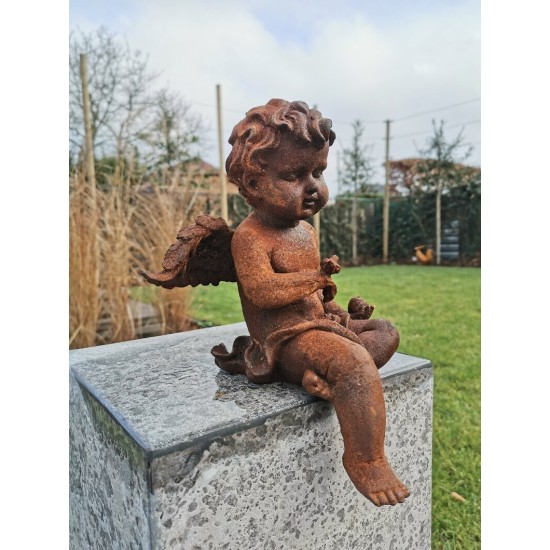 Antique garden sculpture of an Angel (boy) - Sitting model