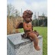 Antique garden sculpture of an Angel (boy) - Sitting model