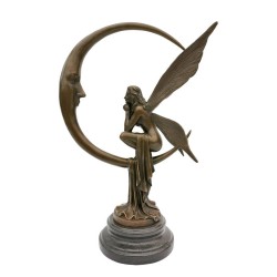 Amazing bronze sculpture of a bronze fairy sitting on the moon