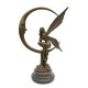 Amazing bronze sculpture of a bronze fairy sitting on the moon