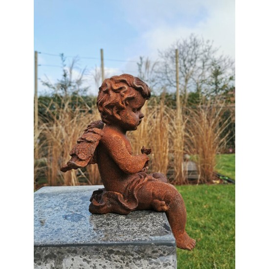 Antique garden sculpture of an Angel (boy) - Sitting model
