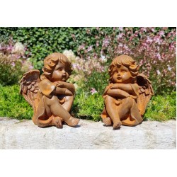 Pair of seated angels in cast iron - garden decoration - Angels
