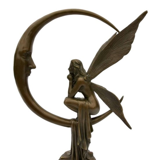Amazing bronze sculpture of a bronze fairy sitting on the moon