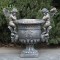 "Amorini" Magnesium Urn with Cherub Statues