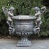 "Amorini" Magnesium Urn with Cherub Statues